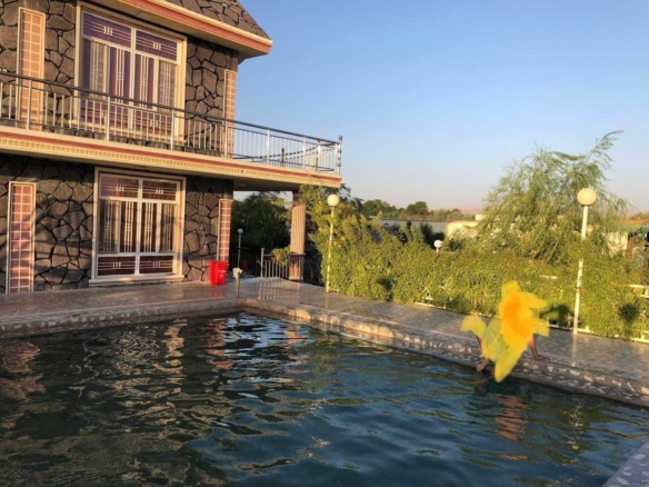 Beautiful garden with small building for sale in Herat province