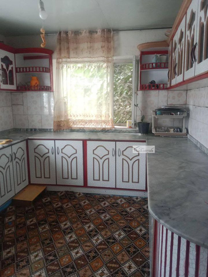Nine-room house for sale urgently in Rahman Mina, Kabul