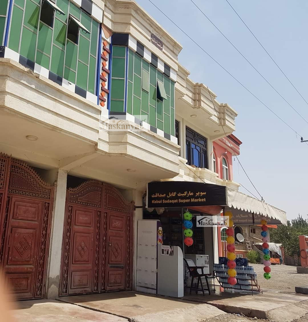 House with two shops for sale in Taliqan Town, Takhar